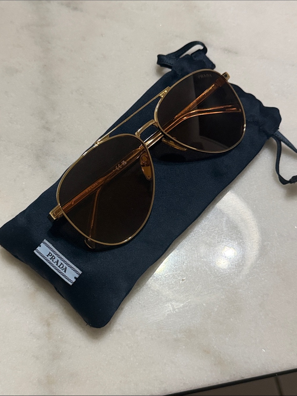 Prada Amber/Brown Lens Aviator Sunglasses